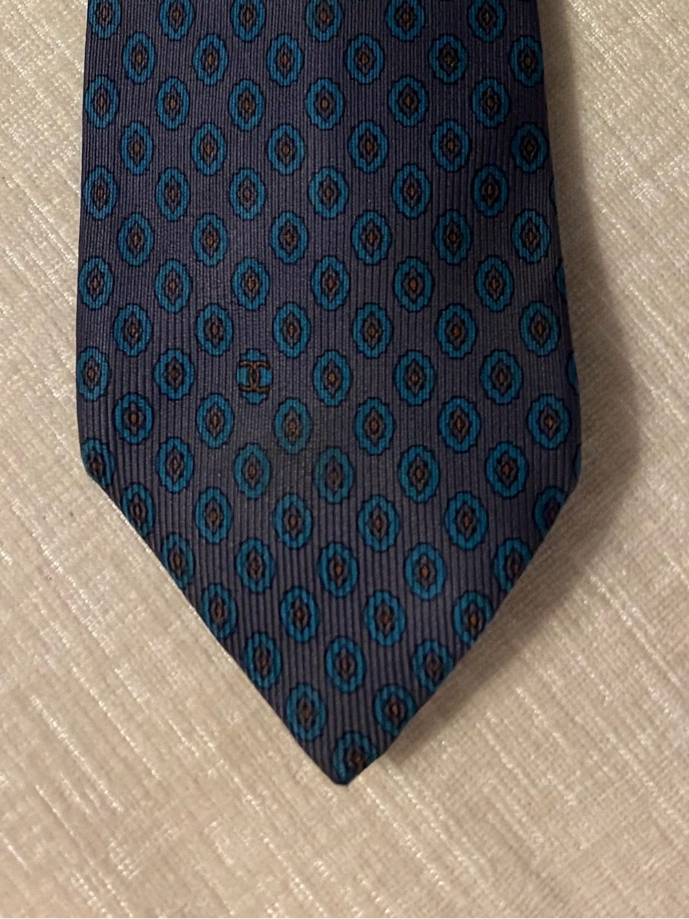 CHANEL Tie with Teal Medallion Pattern